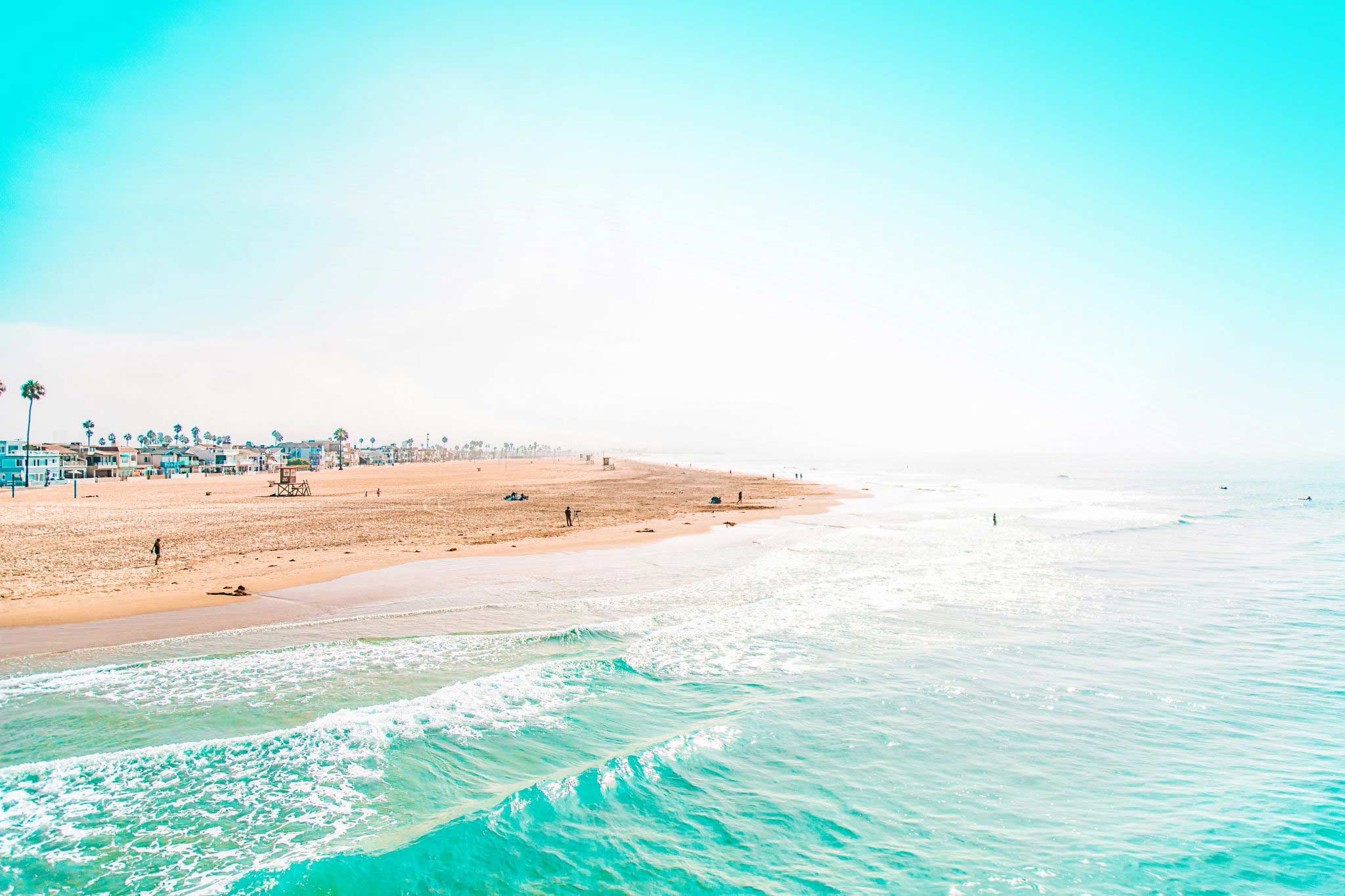 Aerial view of a bright coastline, representing time and money freedom